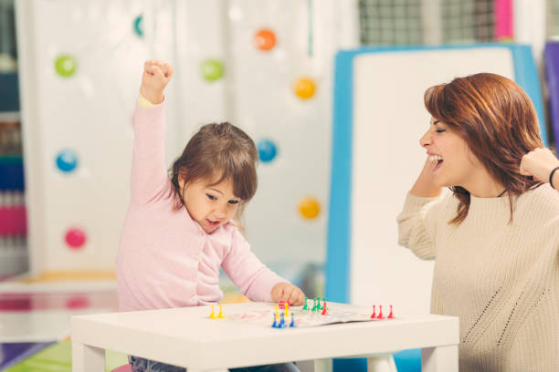 ein ludo spiel - child playroom parent indoors stock-fotos und bilder