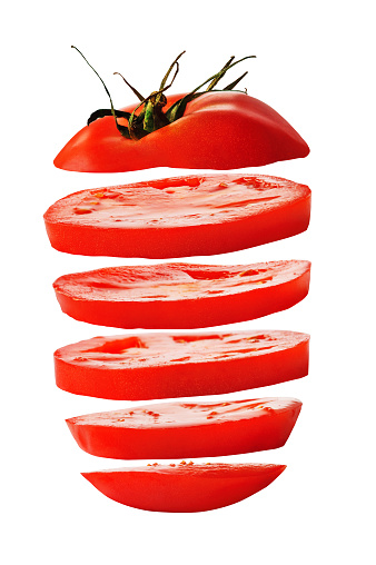 Sliced red tomato isolated on white background