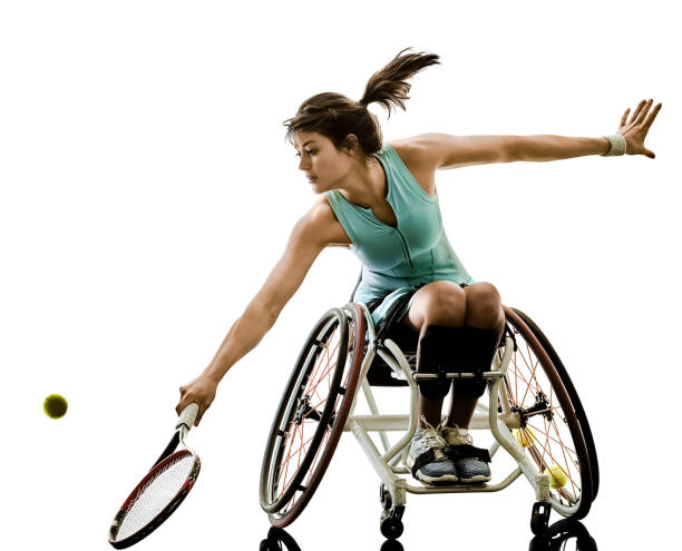young handicapped tennis player woman welchair sport isolated si one caucasian young handicapped tennis player woman in welchair sport  tudio in silhouette isolated on white background athlete with disabilities photos stock pictures, royalty-free photos & images