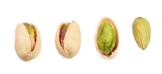 Pistachios isolated on white background, top view. Set or collection.