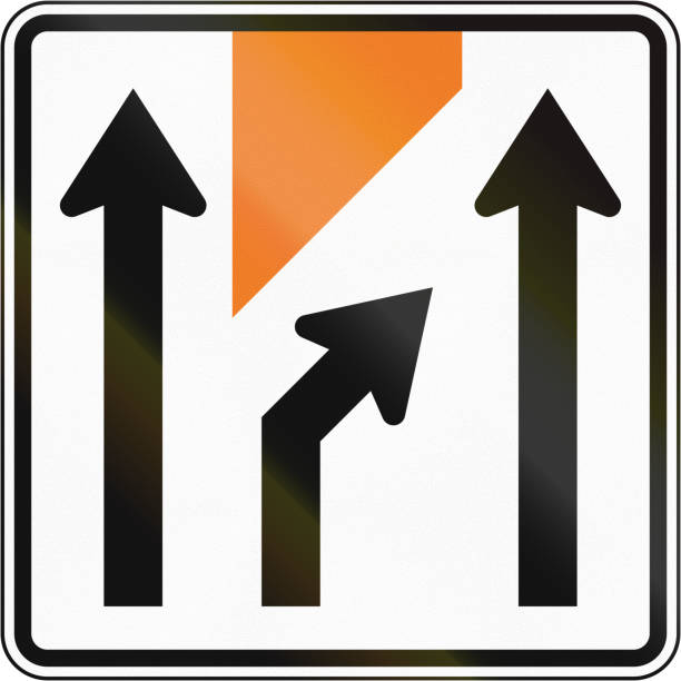 istock New Zealand road sign - Centre lane closed ahead to right 912696514