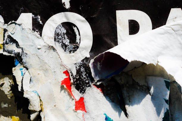 istock Old ripped torn crumpled posters grunge textures backgrounds 912700086