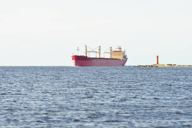 istock Red cargo ship (bulk carrier) sailing in Baltic sea 912700456