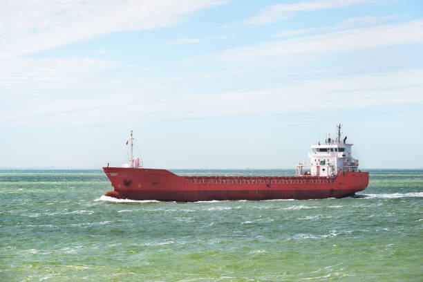 istock Red cargo ship (bulk carrier) sailing in Baltic sea 912700494