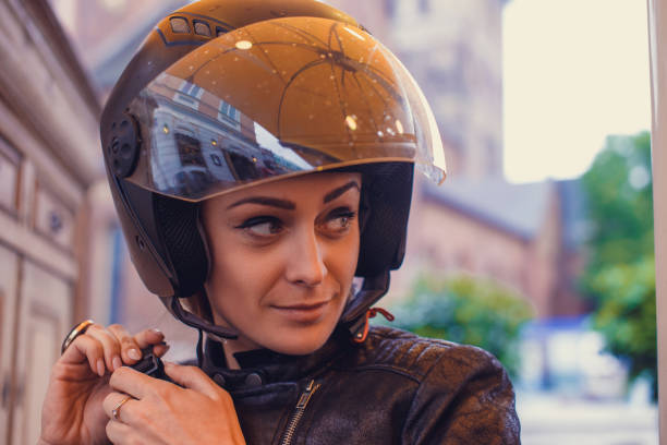 istock A woman in a moto helmet. 912700770