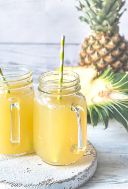 istock Two glasses of pineapple juice 912700776