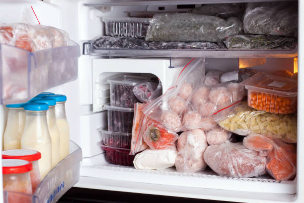 istock Refrigerator with frozen food (meat, milk, fruits and vegetables) 912700852