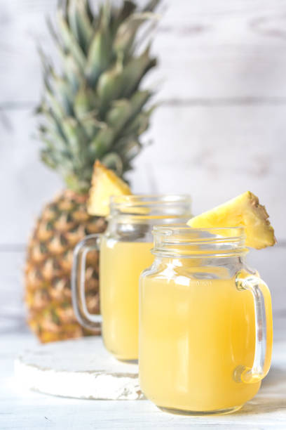 istock Two glasses of pineapple juice 912701486