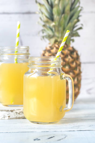 istock Two glasses of pineapple juice 912702058