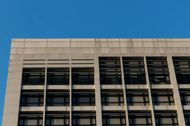 istock Top of white building 912705010