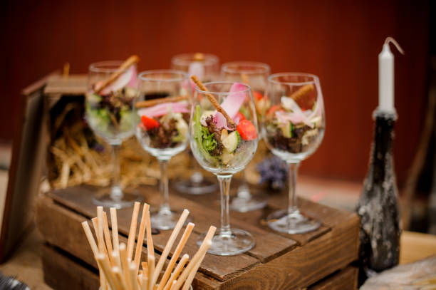 istock Fresh vegetable salad in elegant glasses on the table 912711494