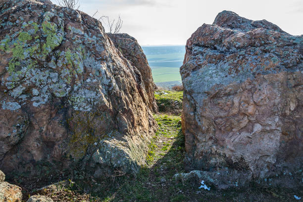 istock Rocks and trees on top of a high hill 912711598