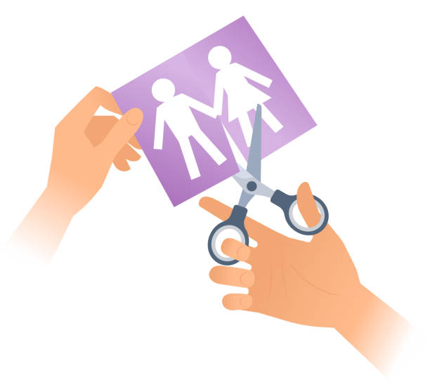 istock Hand with a scissors separates a paper men and women. 912711612
