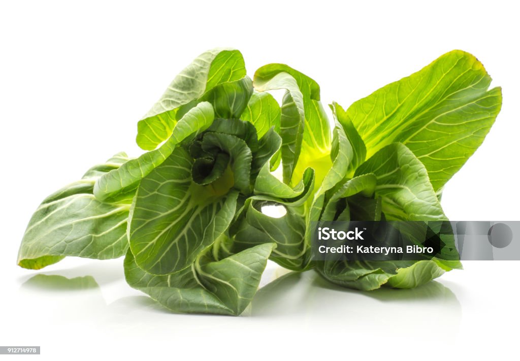 Fresh Bok choy isolated on white Bok choy (Pak choi) two cabbages with green flowerlike leaves isolated on white background fresh raw Blue Stock Photo