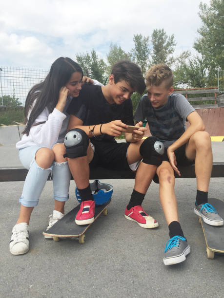 istock Teenagers having fun on skating 912716922