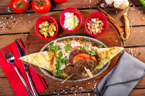 istock Turkish meatball with sauce, bread and salad 912717160