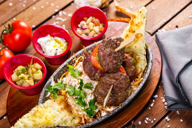 istock Turkish meatball with sauce, bread and salad 912717218