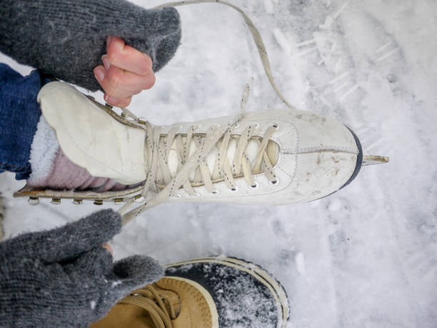 istock Tying Ice Skates Close Up 912719628