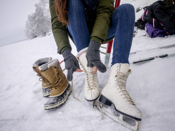 istock Tying Up Ice Skates Close Up 912719648