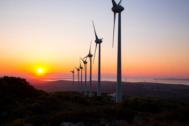 istock Renewable energy with wind turbines 912721440