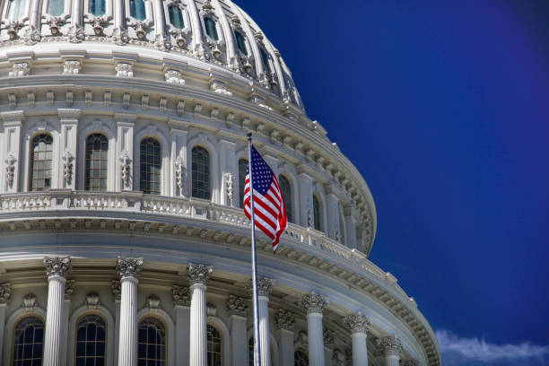 istock U.S. Capitol Building Dome and American Flag in Washington, DC 912723430