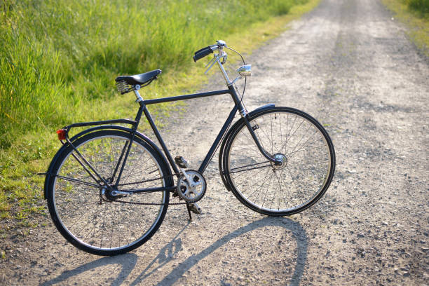 istock Bicycle on the green summer field. 912726434