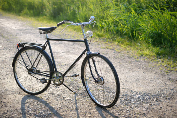 istock Bicycle on the green summer field. 912726464