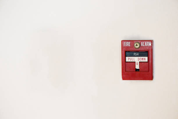 istock fire alarm box on cement wall for warning and security system in the condominium place. standard safety in the resident 912726760