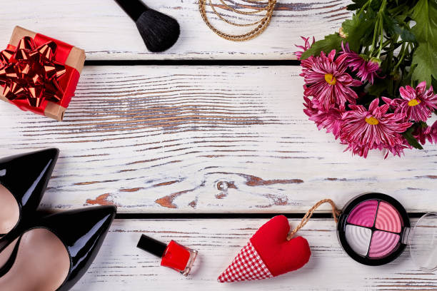 istock Girl's things on wooden background 912726966