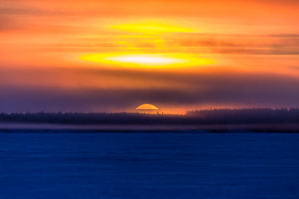 Winter sunrise landscape from Sotkamo, Finland.