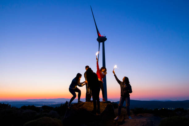 istock Young friends enjoying nature at sunset 912727142