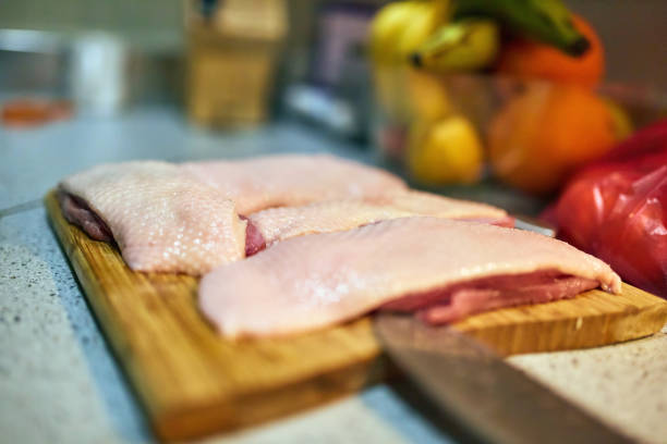 istock Raw duck breast on a wooden board 912727330