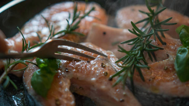 istock raw salmon with rosemary and lemon for lunch 912727674