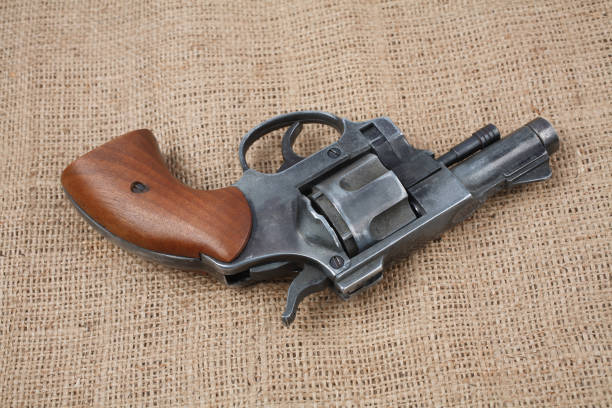 istock Revolver on the canvas background 912734112