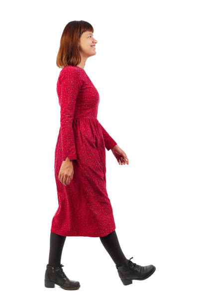 istock back view of walking  woman. 912734356