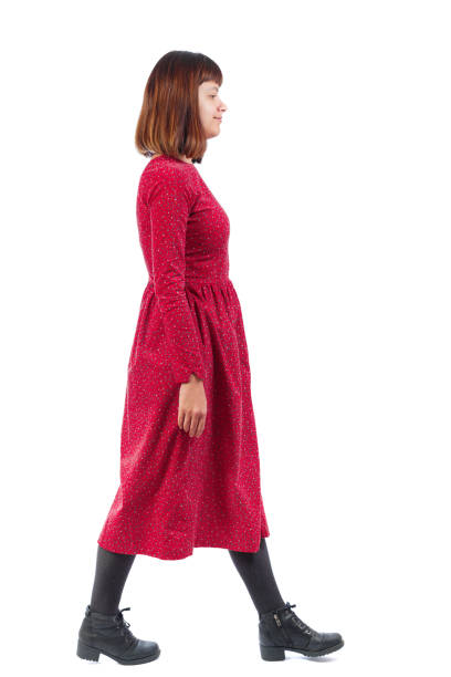 istock back view of walking  woman. 912734472