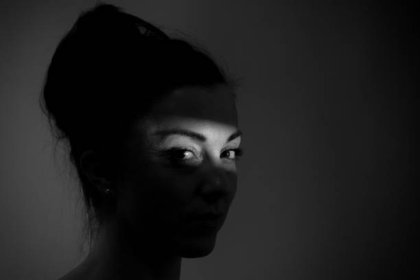 istock Shadow portrait of a women 912734836