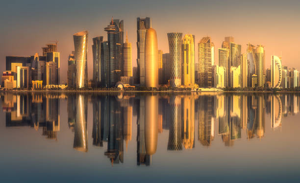 The skyline of West Bay and Doha downtown, Qatar The skyline of West Bay and Doha City Center during sunret, Qatar qatar stock pictures, royalty-free photos & images