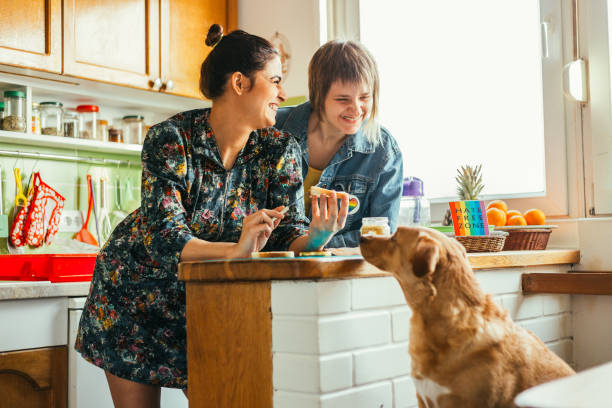 istock Two females enjoing breakfast at home 912741418