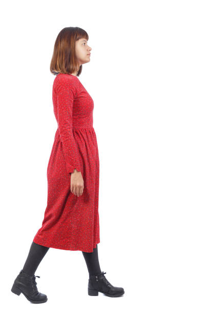 istock back view of walking  woman. 912741846