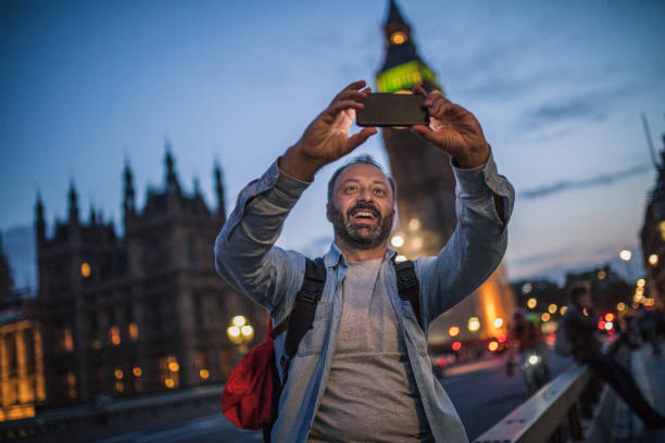 Tourist man in London making selfie