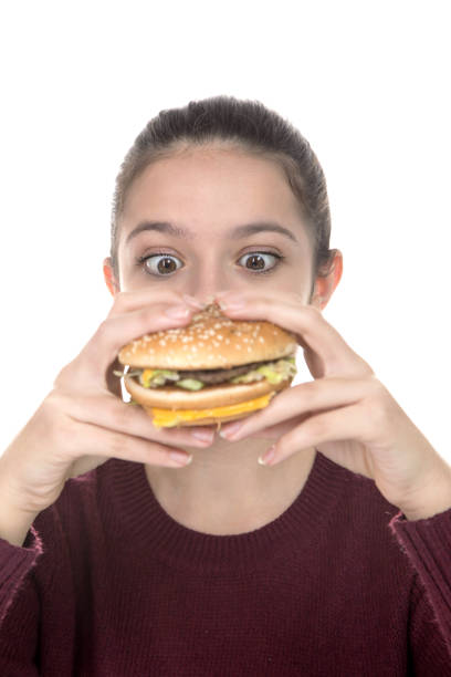 istock Adolescent girl and Hamburger 912742174