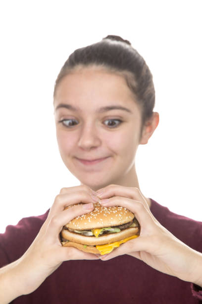 istock Adolescent girl and Hamburger 912744766