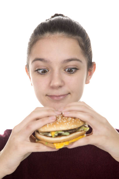 istock Adolescent girl and Hamburger 912744768