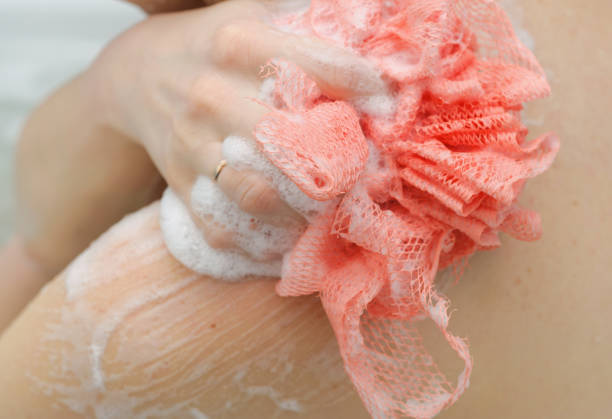 closeup of foam bath sponge. selective focus technique