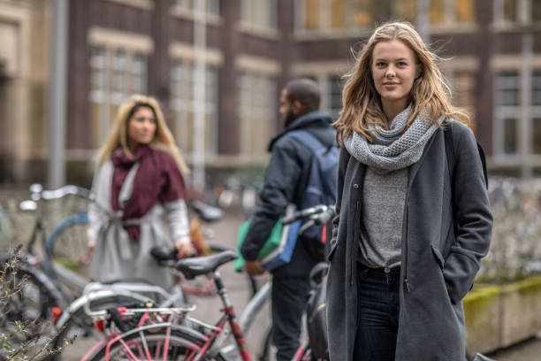 multi ethnic university students going to classes in the netherlands - dutch ethnicity imagens e fotografias de stock