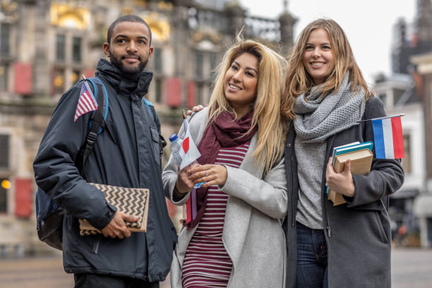 Multi ethnic university students going to language classes in the Netherlands stock photo