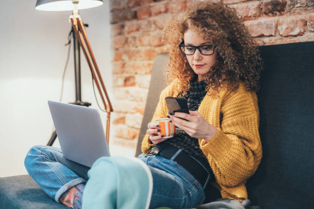 istock Woman surfing the net at home 912760942