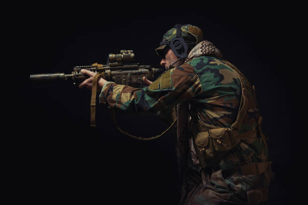 istock soldier of the American special forces with a rifle chooses a target 912763530
