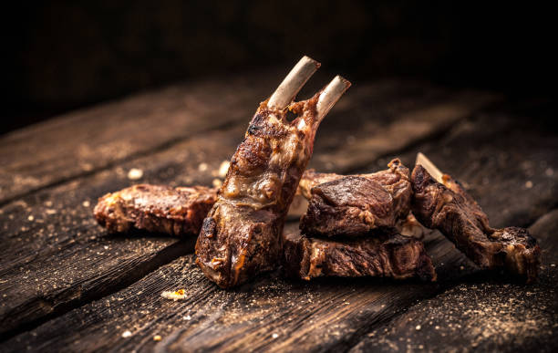 istock Grilled lamb chops on wooden table 912763834